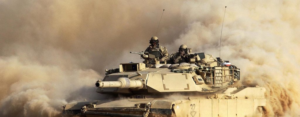 A U.S. Army 3rd Infantry Division M1/A1 Abrahams tank moves deeper into Iraqi territory March 23, 2003 south of the city of An Najaf.  U.S. and British forces continue to assault Iraq from land, sea and air as part of the ongoing Operation Iraqi Freedom. (Photo by Scott Nelson/Getty Images)